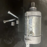 Aprilia RSV4/TUONO/RS/TUAREG Starter Motor + Gear, B044495, 1A012162 Used. Price: $50.00.